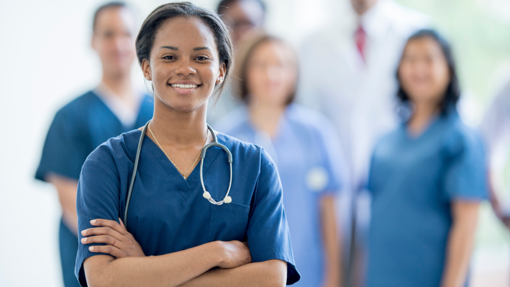 Doctor with team behind her